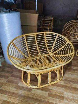 The finished rattan papasan chair brings comfort and natural style to any home.